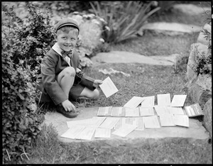 Jack Sharkey, Jr. sorting telegrams for his father