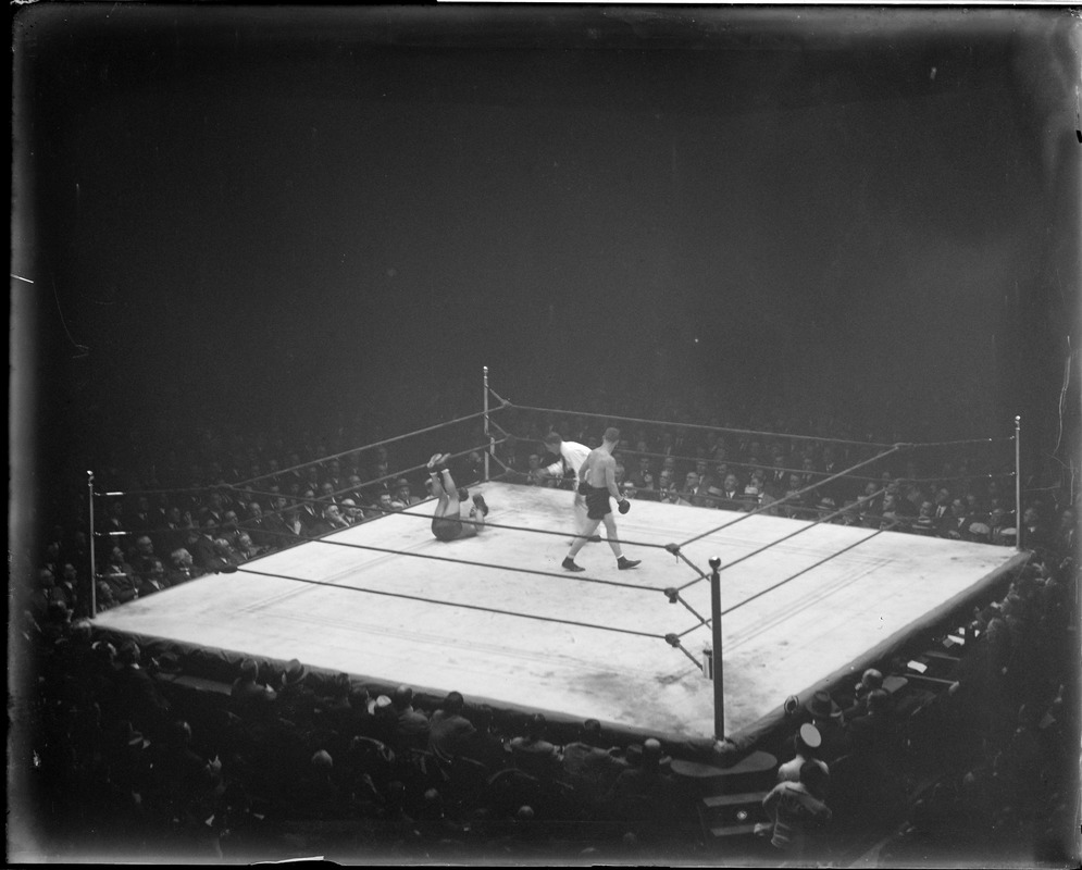 Haakon Hanson of Norway knocks out Eddie Adonis of Roxbury in 5th round at the Boston Garden. Referee is John Brassill
