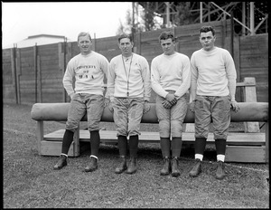 L-R. Adam Walsh, Eddie Casey, Fessler and Myles Lane, coaches on the Harvard team