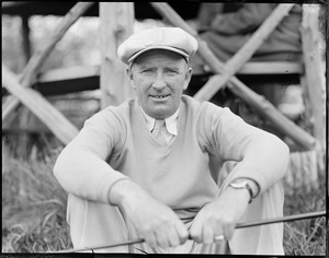 Golfer poses for camera