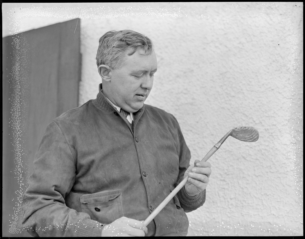 Jesse Guilford with favorite golf club