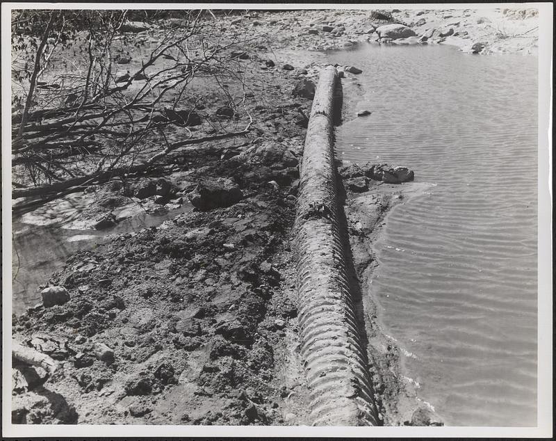 Dam showing pipe only of photograph #27