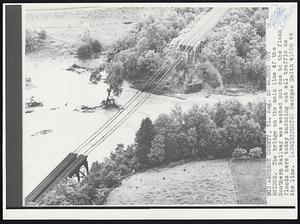 Amherst County, VA. Washed Out Bridge. The bridge on the main line of the Southern Railway was washed out due to the flash floods here today knocking out all traffic on the line. Weather. Hurricane Camille.