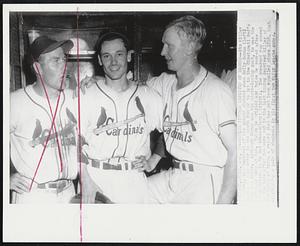 Rookie Pitcher Deprived of Record-- Stu Miller (center), was deprived of his second shutout when Solly Hemus (left) made a little error in the ninth inning to let in the Cincinnati Red’s only run today. Although Hemus was the ninth-inning goat, he was the Cardinals hero a bat. Twice he tripled and twice he scored after being driven in by Red Schoendienst (right). The unearned run scored by the Reds after two were out in the last inning deprived Miller of the honor of trying a record that has not been equalled since 1898, that of pitching a pair of shutouts in his first two Major League games.