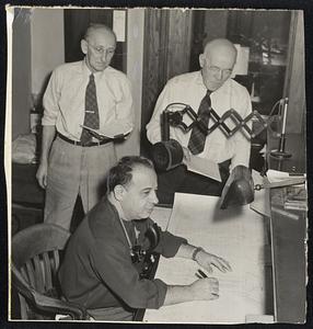 During Strike:-Dispatchers Jack Gordon, H.C. Parmenter, left, and John at South Station tackle that problem. RR... 1951