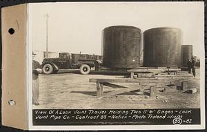 Contract No. 85, Manufacture and Delivery of Precast Concrete Steel Cylinder Pipe, Southborough, Framingham, Wayland, Natick, Weston, view of a Lock Joint trailer holding two 11 ft. 6 in. cages, Natick, Mass., Nov. 10, 1939