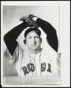 Scarborough in New Suit--Rae Scarborough, Boston Red Sox pitcher, tries on his new uniform that he will wear for the Boston fans this coming season.Scarborough,32-year-old North Carolinian, was traded recently to the Red Sox by the Chicago White Sox along with left handed pitcher Ed Wight.