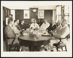 Seek Five-Day Week. A New England Committee, led by governor Winant of New Hampshire, in conference in Washington August 1 with Secretary of Labor Boak on means to create new jobs. Governor Winant believes that the plan for shorter working days and weeks would provide 3,000,000 jobs. Left to right: James M. Langley, Concord, N.H., editor and chairman New Hampshire unemployment relief committee; Harold M. Davis, Nasua, N.H., William Phillips, Boston, chairman Massachusetts Emergency Committee on unemployment; Governor Winant: Secretary Doak; H.P. Kendall, Boston: Joseph Lafontaine, Brockton, Mass; Charles E. Baldwin, Bureau of Labor Statistics; Thos. E. Campbell, President Civil Service Commission.