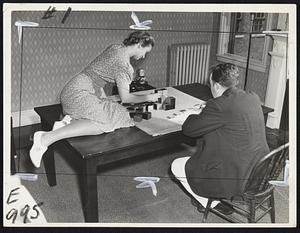 A Visit To a Human Engineering Laboratory. This young lady is being timed [illegible] blocks together as instructed at the Human Engineering Laboratory at Stevens Institute of Technology. This is a measure of her aptitude for visualizing three-dimensional structure - an aptitude in which surgeons, engineers, sculptors and architects score high, but in which sales people, for instance, score low. Like other aptitudes which the Laborator[y] [illegible] [a]ble to measure, this is an inherent unacquirable characteristic.