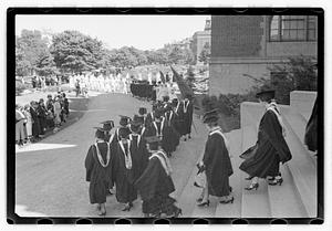 Religious procession leaving Eisner Administration building, Emmanuel College