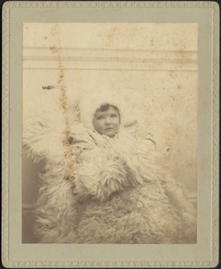 Baby bundled up in fur, probably Langford Warren