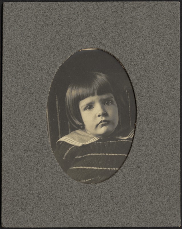 Young boy (bobbed hair) in striped sweater and sailor collar