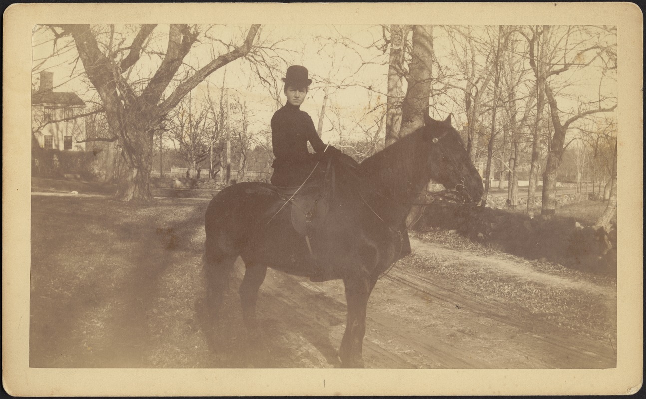 Ashdale Farm. Woman on horseback on dirt road, possibly Gertrude S. Kunhardt.