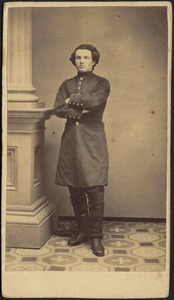 Edward Myron Granger in Civil War uniform standing next to column