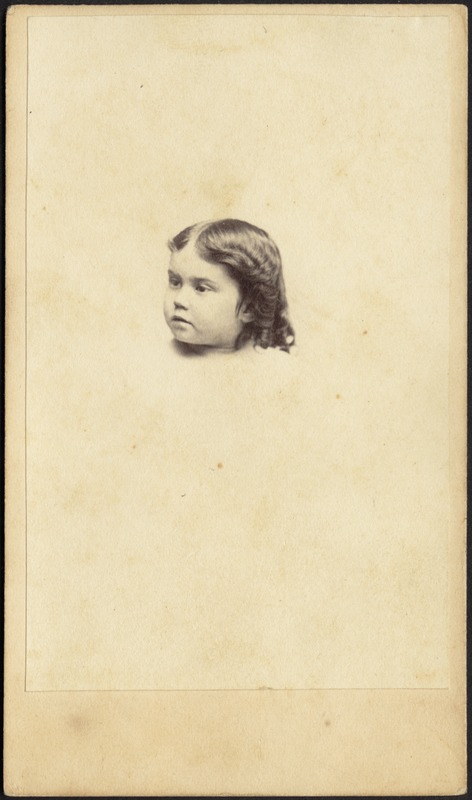 Head of young child, dark ringlets