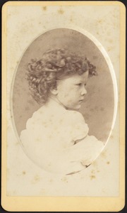 Profile of young child with curly hair