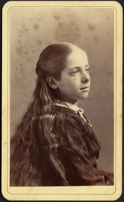 Young girl with long hair (head and shoulders)