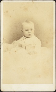 Infant in white dress