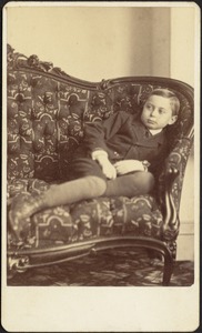 Charles Harwood Brown reclining on sofa