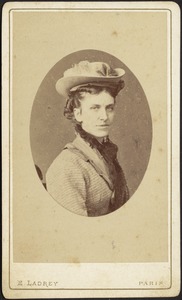 Fashionably dressed woman in hat