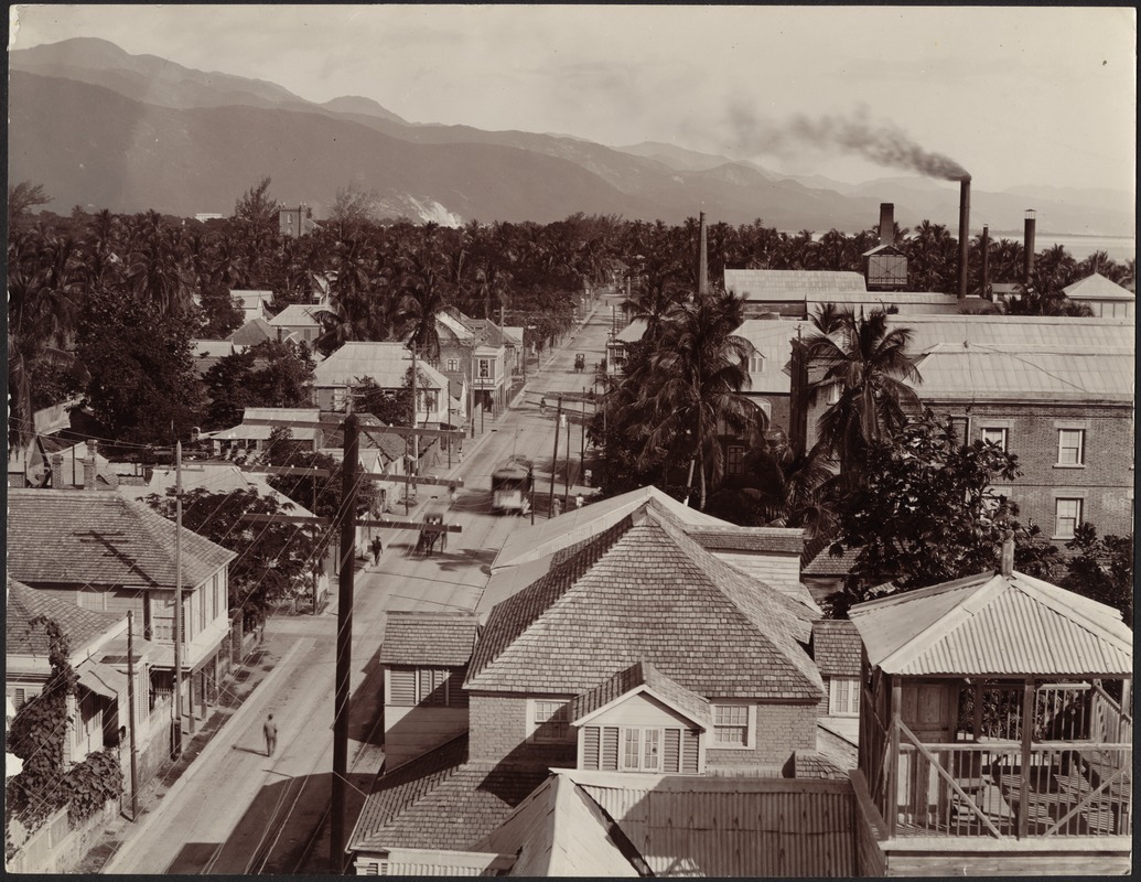 Birds-eye view of Harbour Street in Kingston, Jamaica; mountains in distance