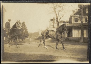 Ashdale Farm. Otto and Gertrude Kunhardt on horseback on side of main house