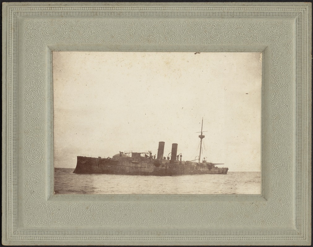 Fire damaged vessel, possibly the Spanish cruiser Infanta Maria Theresa