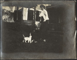 Ashdale Farm. Unidentified woman on lawn with dog.