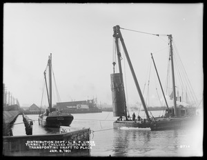 Distribution Department, Low Service Pipe Lines, tunnel at Chelsea North Bridge, transporting shaft to place, Mystic River; Charlestown; Chelsea, Mass., Jan. 8, 1901