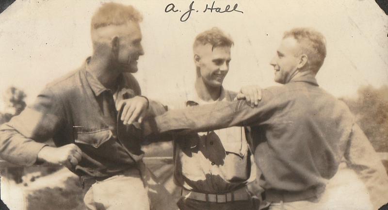 Three U.S. Marines, A. J. Hall in center, Marine base Quantico, VA