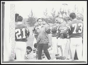 Coach Shula Directs Traffic--Coach Don Shulla of the Baltimore Colts, has a word with his team while going through daily workouts at St. Andrews field. No. 21 is Rick Volk, No 72 is Bob Vogel who scratches his head, no 73 on right is, Sam Ball.