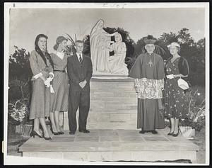 Shrine Given by Tobin Family – The Holy Family Shrine donated by the family of the late Maurice J. Tobin, secretary of labor, was dedicated on the grounds of Nazareth yesterday by Archbishop Cushing. With him are, left to right, two daughters, Misses Carol and Helen, a son, Maurice, and Mrs. Helen Tobin.