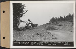 Contract No. 82, Constructing Quabbin Hill Road, Ware, looking ahead at ledge from Sta. 92+20, Ware, Mass., Jul. 7, 1939