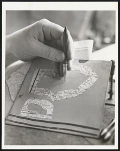 The Map Maker in a Changing World. A boundary change means plenty of work for the Rand, McNally map makers. It involves drafting and engraving dozens of correction patches for existing map plates. Here, a wax engraver is cutting the patch in the wax. It will later be electrotyped and fitted into its proper place.