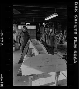 Ralph Johnson and Pert Lowell in boat shop