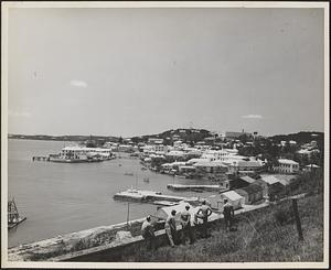 The picturesque town of St. George, Bermuda, as viewed from a nearby hill by a group of touring marines