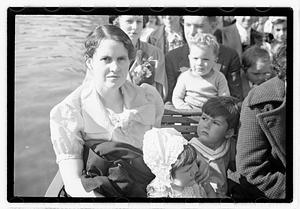 People on a swan boat including Maude Sanromá