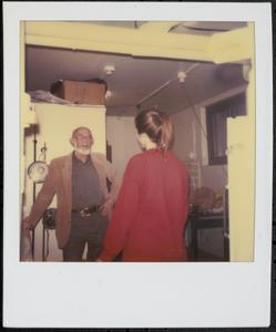Woman talking to an older man