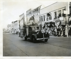 WWII victory parade, Main St., Kampersal's Dairy float