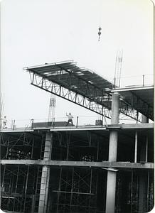 Building materials lowered onto 5 Cambridge Center