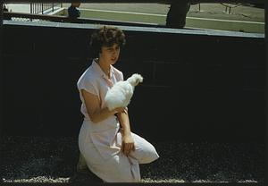 Woman holding a bird