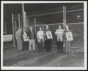 Somerville Ford Pickets -- On strike at the Somerville Ford plant at 12:01 this morning were these members of Local 901, United Auto Workers, CIO. Leading the picket line is William A. Caton, right, of Somerville, president of the local.