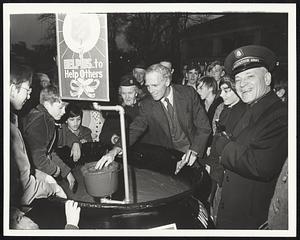 Boston Common. Mayor White Kicks off Salvation Army Kettle Drive. Col. John W. Baggs on right