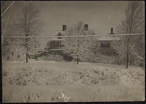 Carman House, shown in snow, darker image