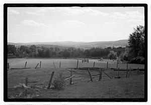 A fence next to a field