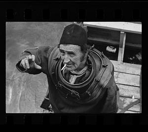 "Hard hat" deep sea diver Arthur Mercer at Charles River Dam, Boston
