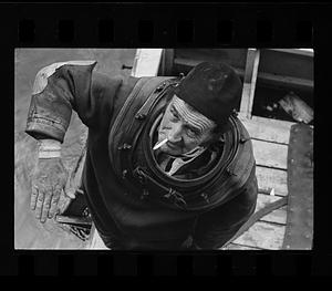"Hard hat" deep sea diver Arthur Mercer at Charles River Dam, Boston