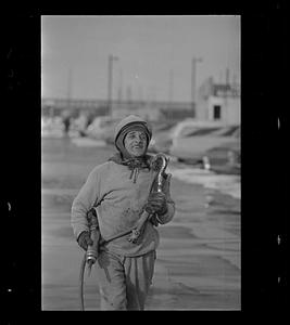 Construction worker at end of shift, Logan Airport, East Boston