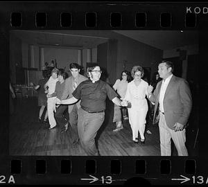 Dancing priest celebrates S. Lester Ralph's mayoral victory, Somerville