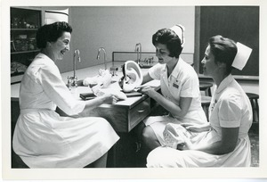 Instructor with Students in Nursing Arts Lab